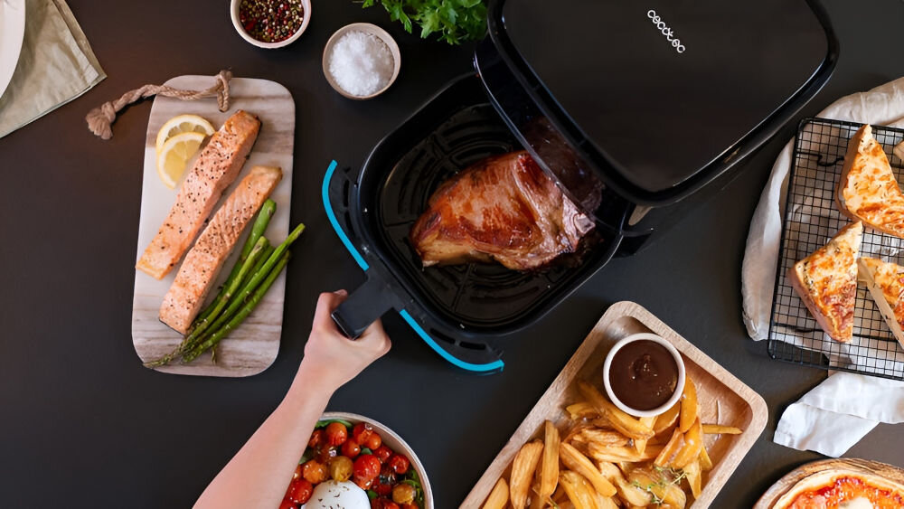 Frytkownica beztłuszczowa CECOTEC Cecofry Full InoxBlack 5500 Pro Air Fryer kontrola temperatury wbudowany termostat płynna regulacja temperatury precyzyjne dostosowanie ciepła optymalne rezultaty kulinarne