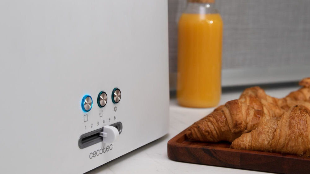 Toster CECOTEC Toast&Taste 1000 Extra Biały funkcjonalny dedykowane programy do opiekania rozmrażania dostosowanie pracy do potrzeb sześć poziomów opiekania ustawinie intensywności opiekania rozkładany pręt podgrzewanie bułek rogalików kawałki ciasta zwiększona funkcjonalność