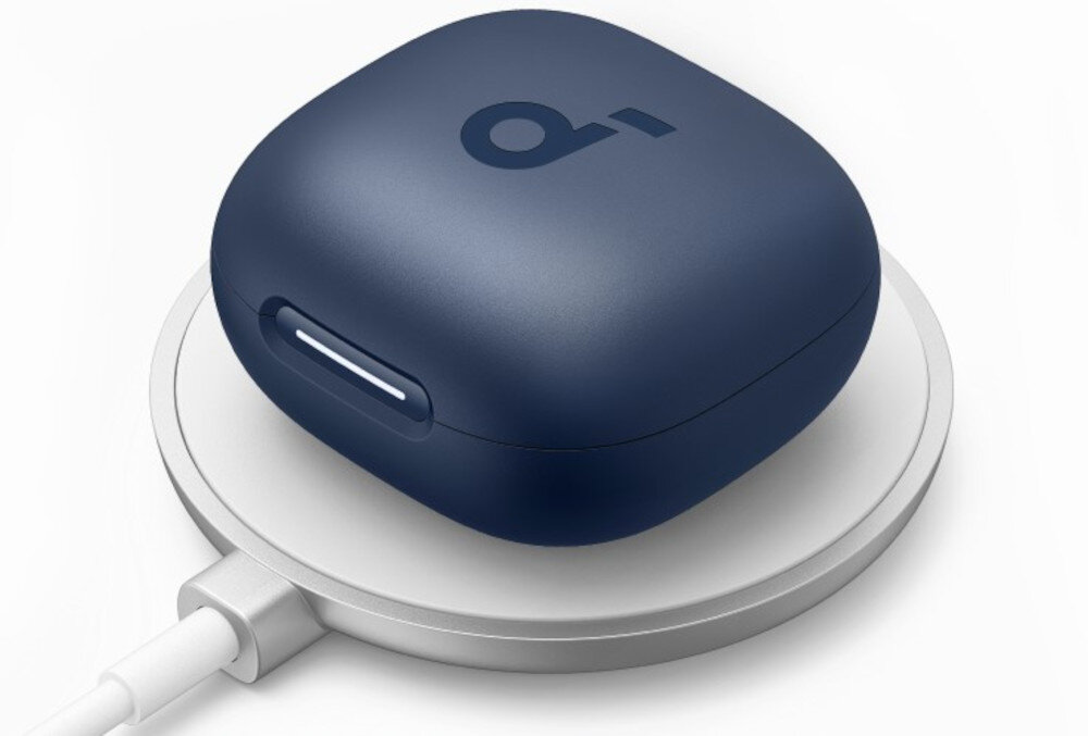 Słuchawki dokanałowe SOUNDCORE P40i ANC ładowanie bezprzewodowe indukcyjne etui, etui ładukące położone na ładowarce indukcyjnej