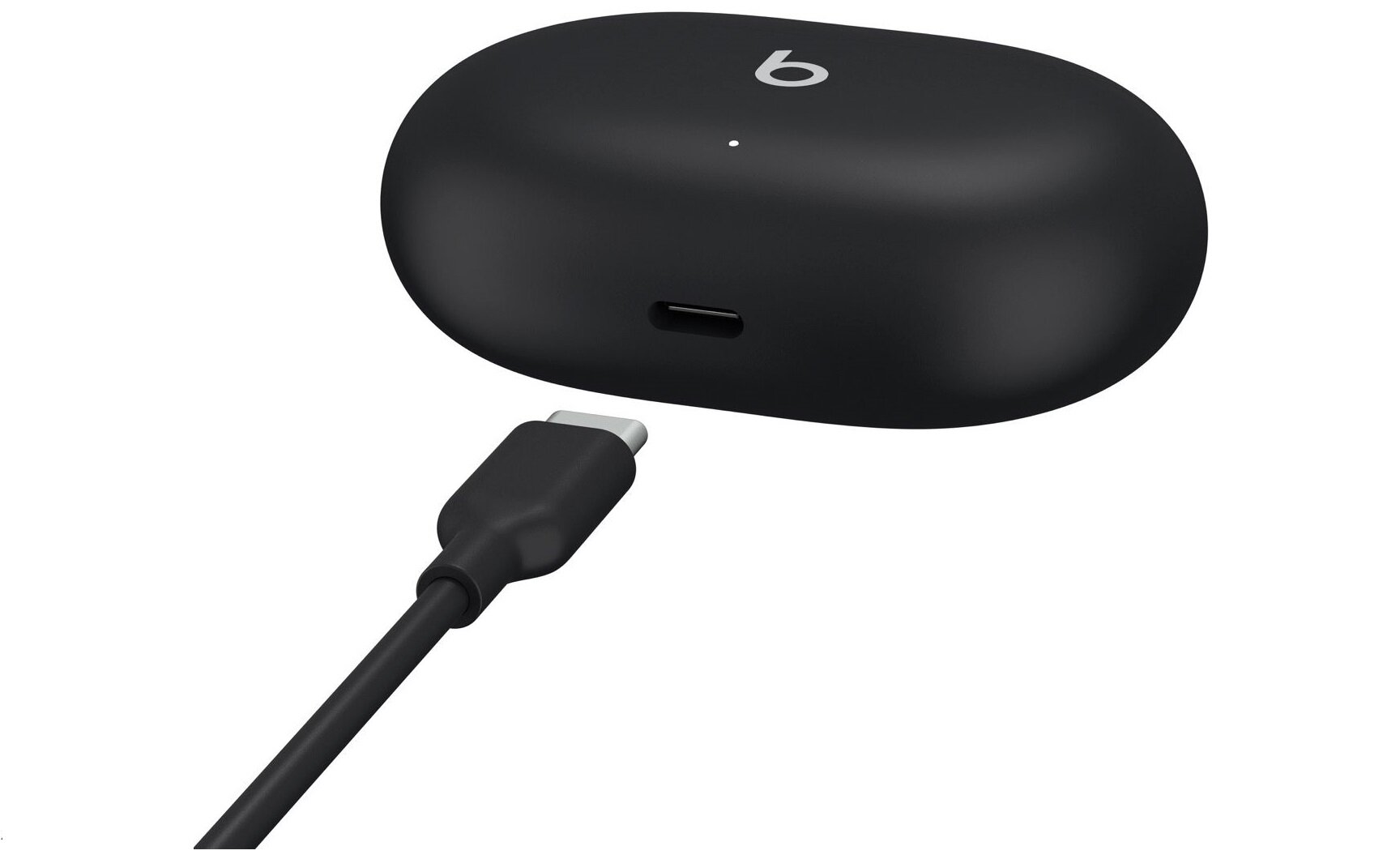 Czarne etui na słuchawki z logo \'b\' na górze oraz portem ładowania z przodu. Obok znajduje się kabel z końcówką USB-C.