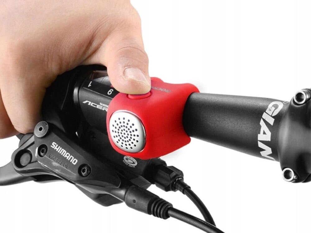 Dzwonek rowerowy ROCKBROS CB1709RD Czerwony, ergonomia, przycisk, obsługa, wygoda, Zbliżenie na dzwonek zamocowany obok manetki biegów.