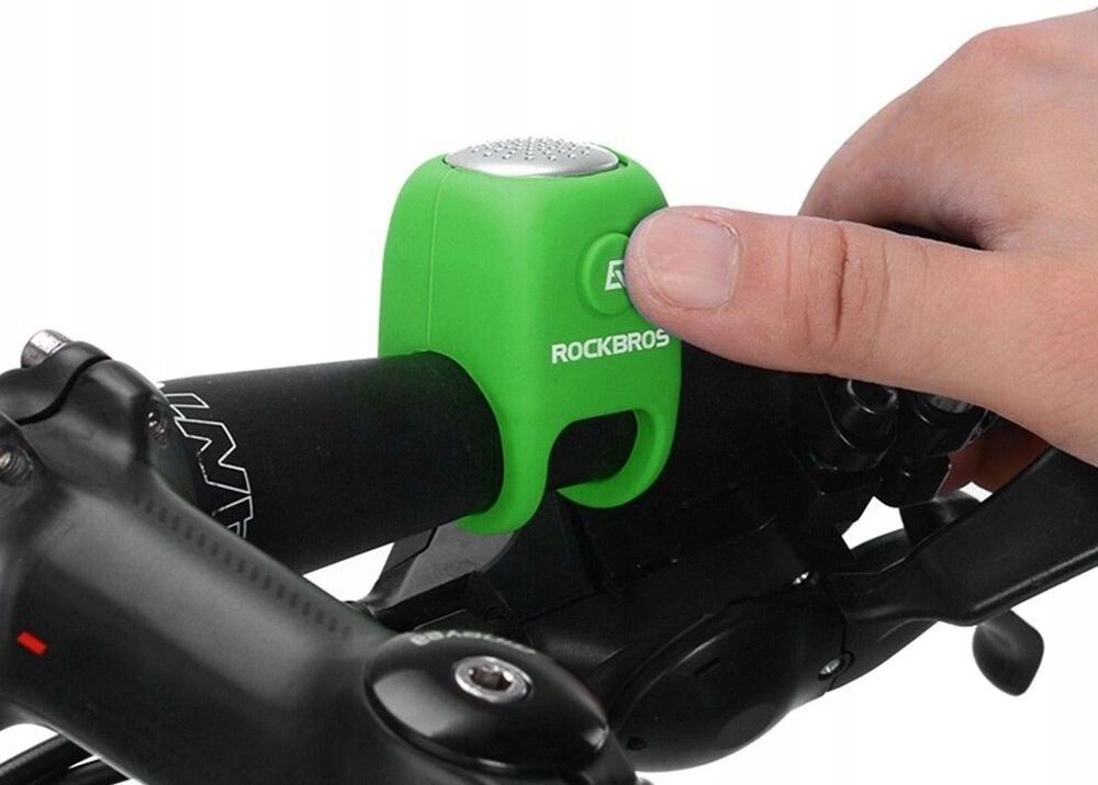 Dzwonek rowerowy ROCKBROS CB1709GN Zielony, ergonomia, przycisk, obsługa, wygoda, Zbliżenie na dzwonek zamocowany obok manetki biegów.