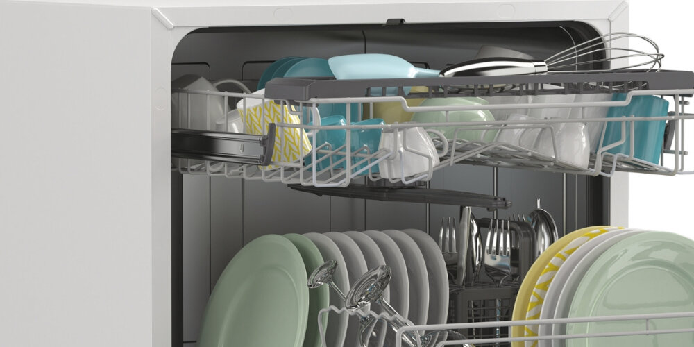 ZMYWARKA CANDY CP 8F9FFW RAPIDO Funkcjonalne wyposażenie wnętrze uchwyt na sztućce akcesoria kuchenne przestrzeń oszczędność miejsca