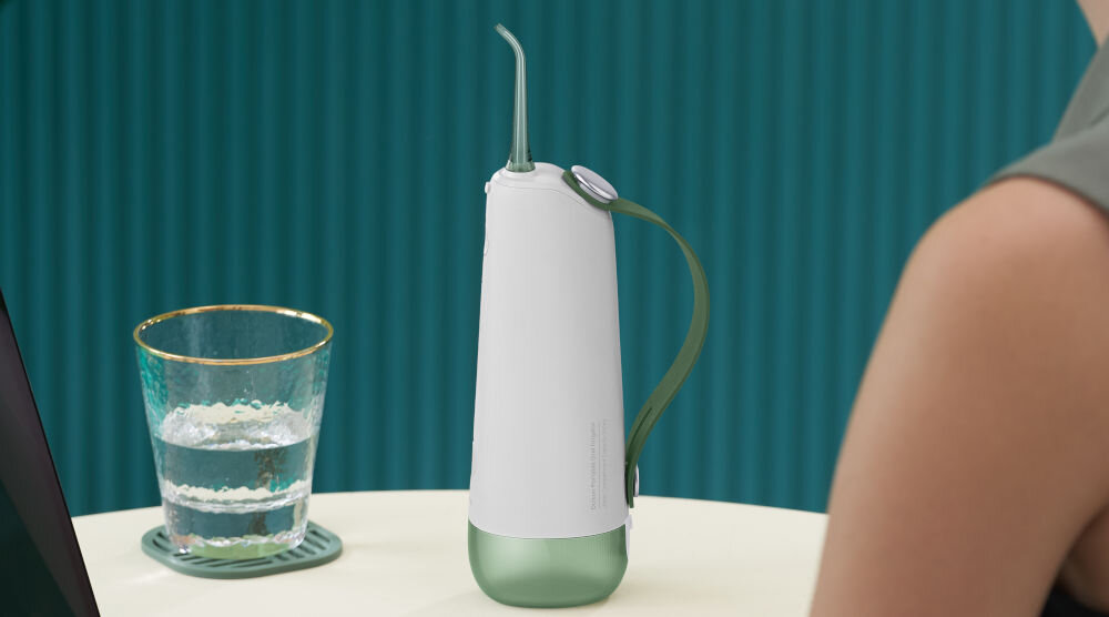 Irygator OCLEAN W10 Zielony ułatwienie codziennej higieny jamy ustnej skuteczne czyszczenie trudno dostępnych miejsc zapobieganie kamieniu nazębnemu próchnicy utrzymanie świeżego oddechu idealne rozwiązanie dbanie o zdrowie zębów i dziąseł bardziej efektywnie