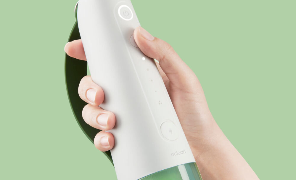 Irygator OCLEAN W10 Zielony elegancki design ergonomiczna konstrukcja antypoślizgowa taśma z silikonu regulacja długości paska idealne dopasowanie do każdej dłoni skuteczne korzystanie komfortowe lepsze doświadczenia