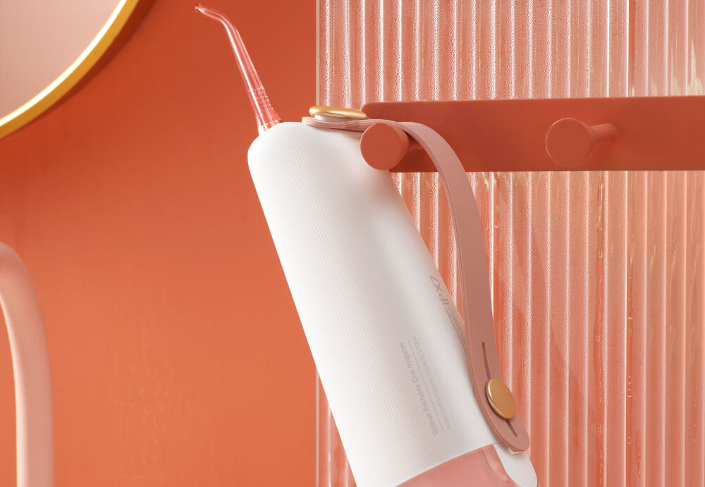 Irygator OCLEAN W10 Różowy elegancki design ergonomiczna konstrukcja antypoślizgowa taśma z silikonu regulacja długości paska idealne dopasowanie do każdej dłoni skuteczne korzystanie komfortowe lepsze doświadczenia