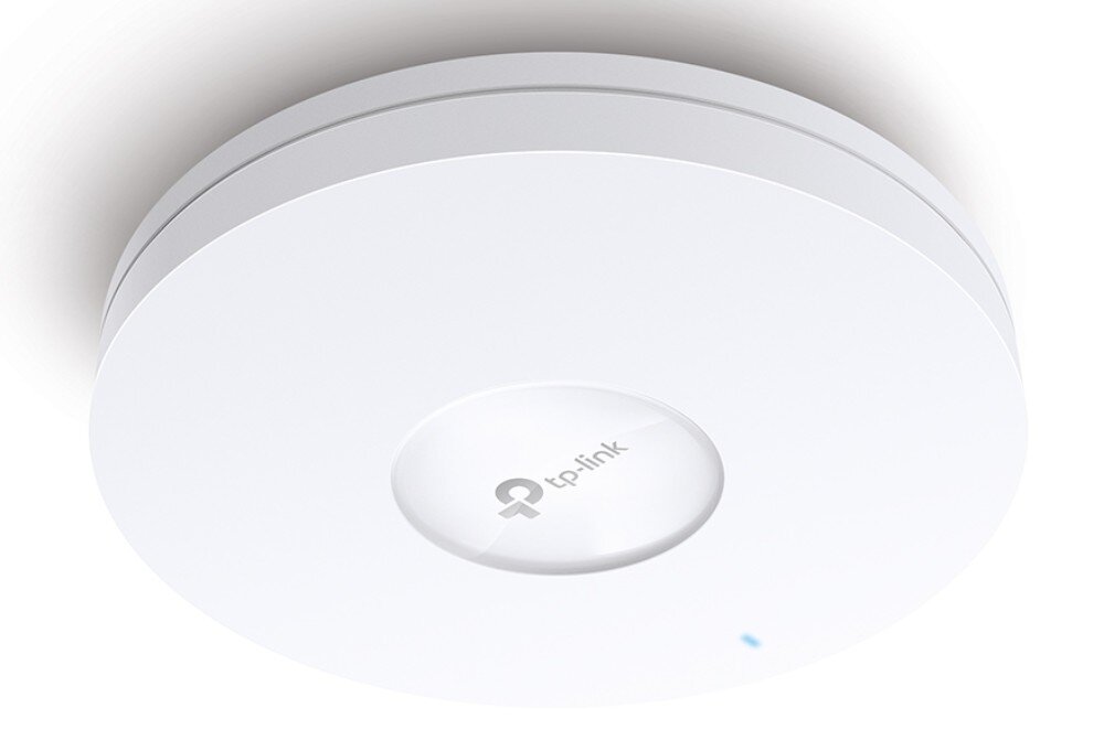 Biały, okrągły punkt dostępu z logo \'tp-link\' na środku i małą niebieską diodą na obudowie.