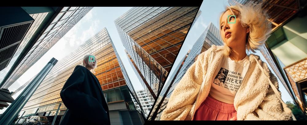 Grafika z dwiema osobami w mieście między wieżowcami; na twarzach zielone ramki AF, u góry napis o autofocusie