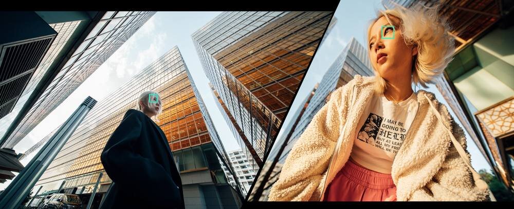 Grafika z dwiema osobami w mieście między wieżowcami; na twarzach zielone ramki AF, u góry napis o autofocusie