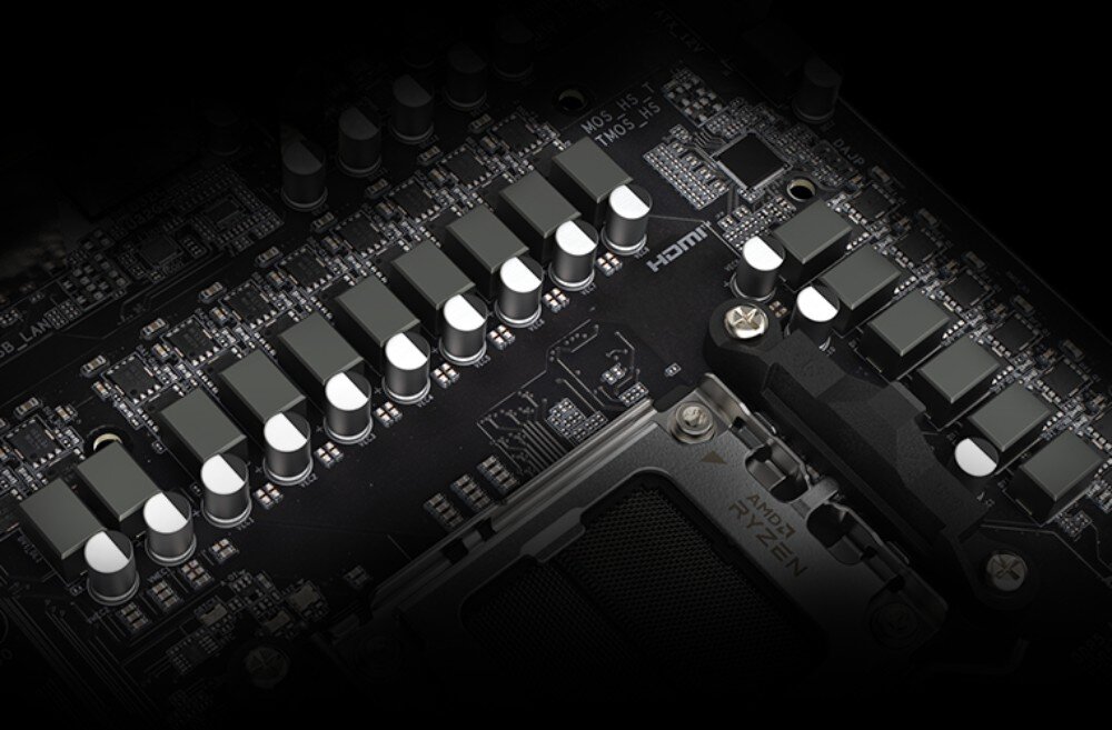 Płyta główna GIGABYTE B650 Eagle Sekcja zasilania procesora z widocznymi dławikami i kondensatorami wokół gniazda CPU