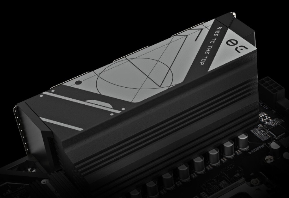 Płyta główna GIGABYTE B650 Eagle Zbliżenie na górną część radiatora VRM z geometrycznym wzorem i napisem 'RISE TO THE TOP'