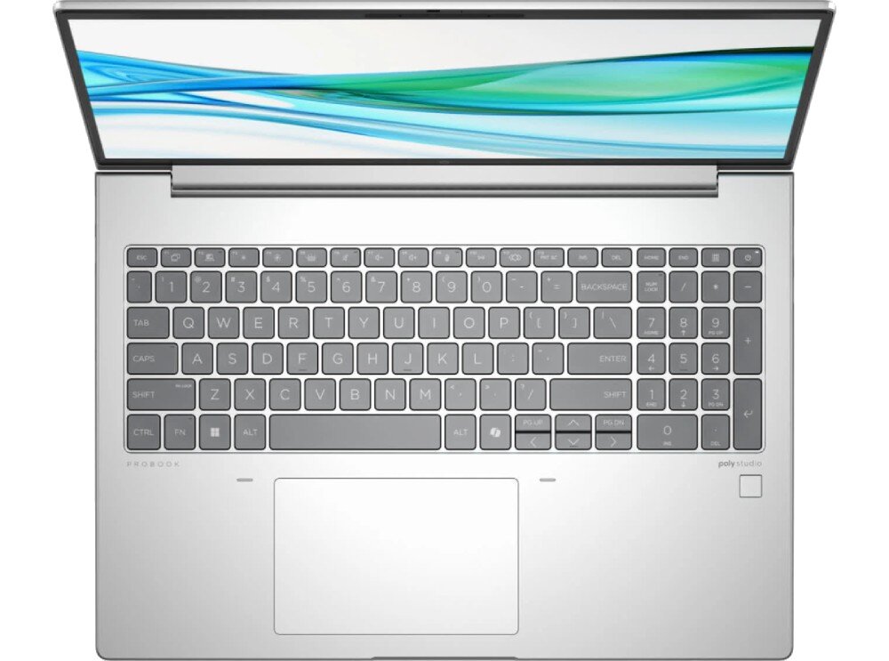 Laptop HP ProBook 440 G11 Widok laptopa z góry, przedstawiający klawiaturę i touchpad. Klawisze w ciemniejszym odcieniu, klawiatura odporność na zachlapania kolor obudowa