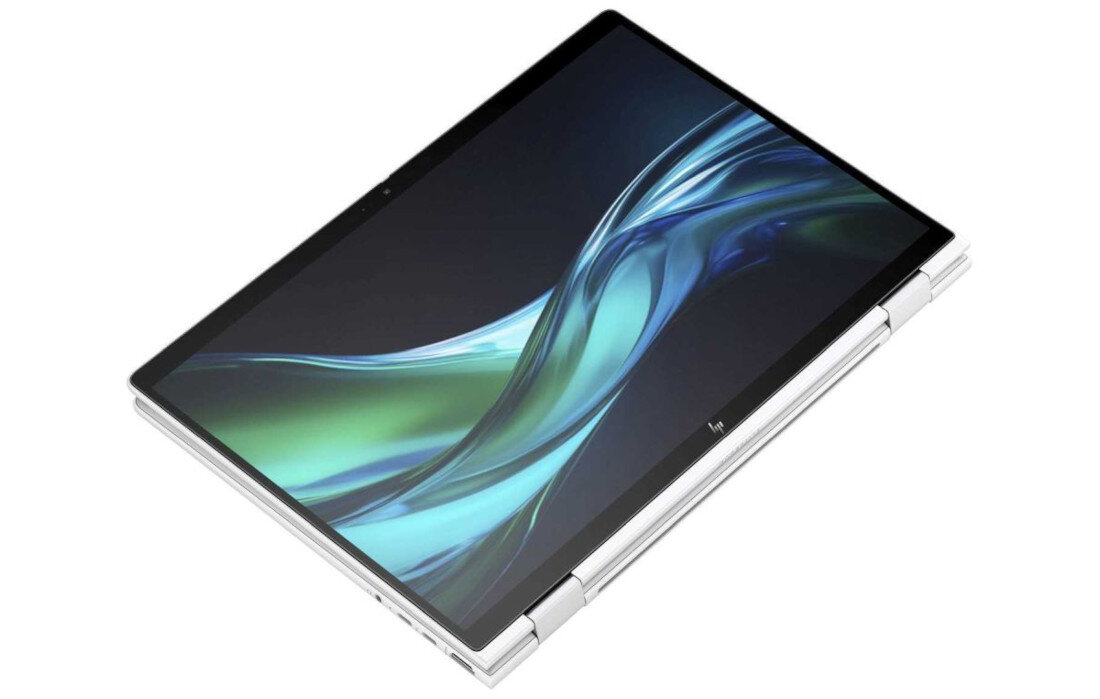 Laptop HP Elite x360 1040 G11 w trybie tabletu, ekran dotykowy z abstrakcyjną grafiką w odcieniach zieleni i błękitu, urządzenie leży płasko na białej powierzchni, widoczne zawiasy 360 stopni umożliwiające pełne odchylenie ekranu. - HP Sure Click, HP Sure Start