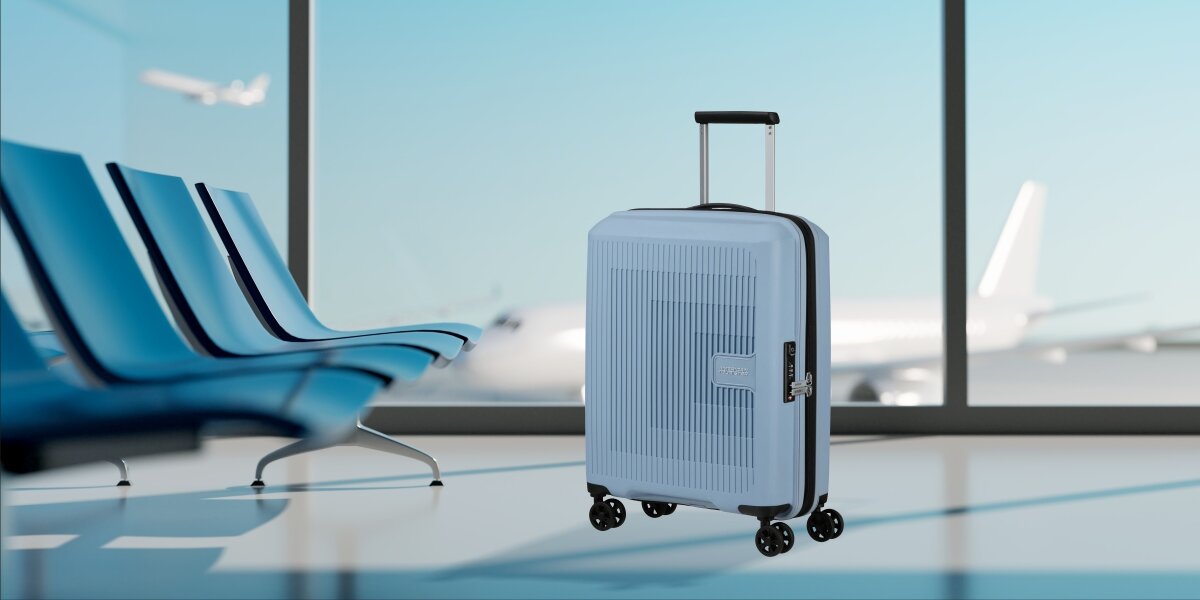 WALIZKA AMERICAN TOURISTER AEROSTEP SPINNER 55 20 SOHO GREY lifestyle lotnisko walizka okno Podróż zaczyna się tutaj trwałość ochrona wytrzymała konstrukcja polipropylen zamek TSA