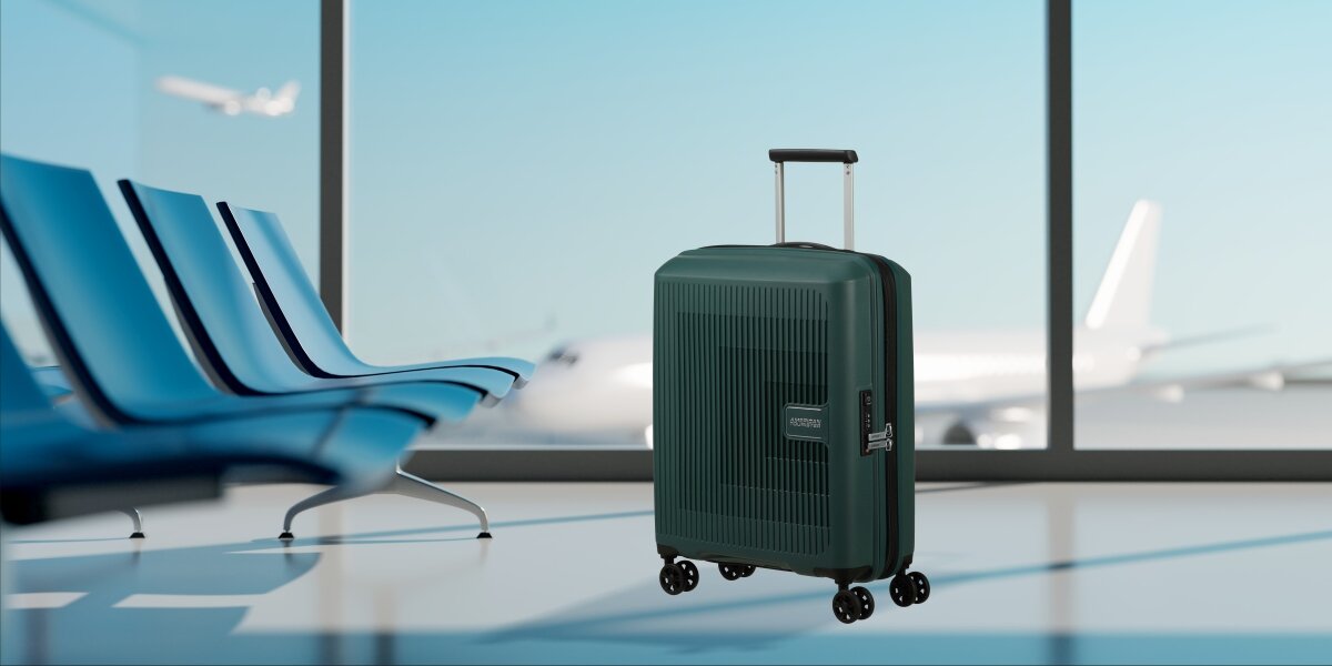 WALIZKA AMERICAN TOURISTER AEROSTEP SPINNER 55 20 DARK FOREST lifestyle lotnisko walizka okno Podróż zaczyna się tutaj trwałość ochrona wytrzymała konstrukcja polipropylen zamek TSA
