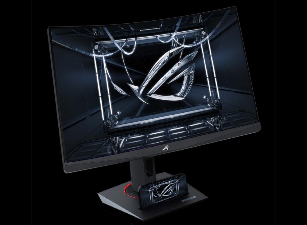 Monitor ASUS ROG Strix XG27WCMS Ekran prezentujący trójwymiarowe, mechaniczne logo na ciemnym tle