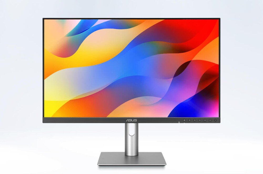 Monitor ASUS ProArt PA278CFRV Monitor na jasnym tle z kolorową grafiką fal w odcieniach czerwieni, żółci, błękitu i fioletu, opis
