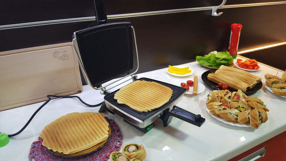 Opiekacz do kanapek DEZAL Inox wszechstronny szybkie smaczne różnorodne przekąski niezawodność srostota obsługi elegancki design funkcjonalne narzędzie kuchenne stylowy dodatek codzienne użytkowanie satysfakcja solidna konstrukcja estetyczny wygląd spełni oczekiwania