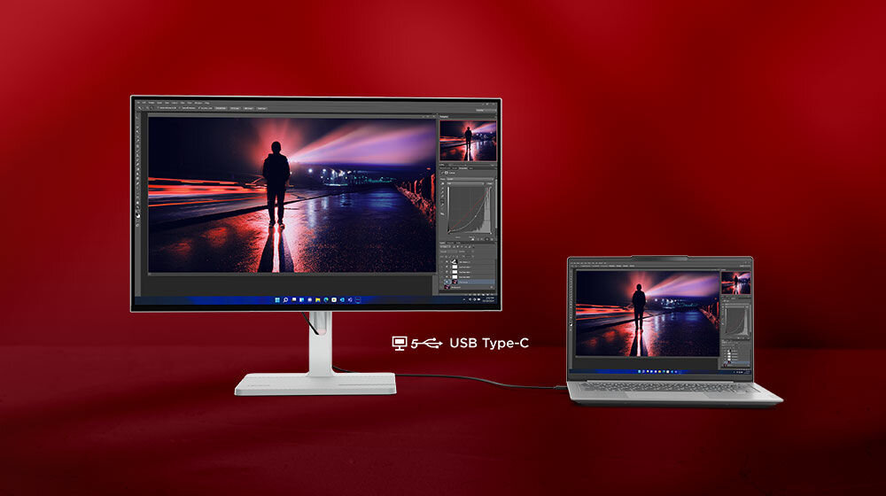 Monitor LENOVO L27h-4A 27 cali 2560x1440px IPS 100Hz 1 ms [MPRT] prezentacja monitora podłączonego do laptopa kablem USB-C/USB-C na czerwonym tle na ekranie program graficzny wygodne ładowanie i podłączenie wbudowany 4-portowy hub USB-A uporządkowane szybkie