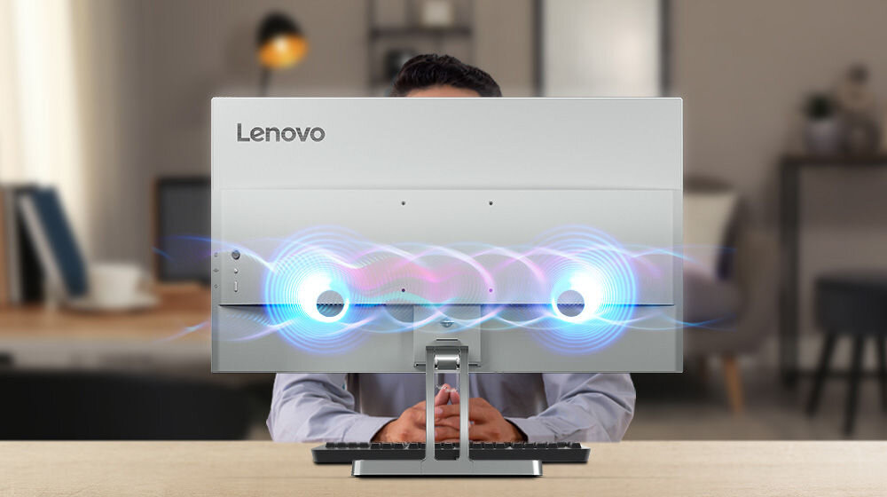 Monitor LENOVO L24i-4A 23.8 cali 1920x1080px IPS 100Hz 1 ms [MPRT] prezentacja monitora od tyłu na biurku graficznie przedstawiony dźwięk wychodzący z głośników dwa głośniki 3W dźwięk z dużą klarownością i szczegółowością wyraźne i zbalansowane brzmienie