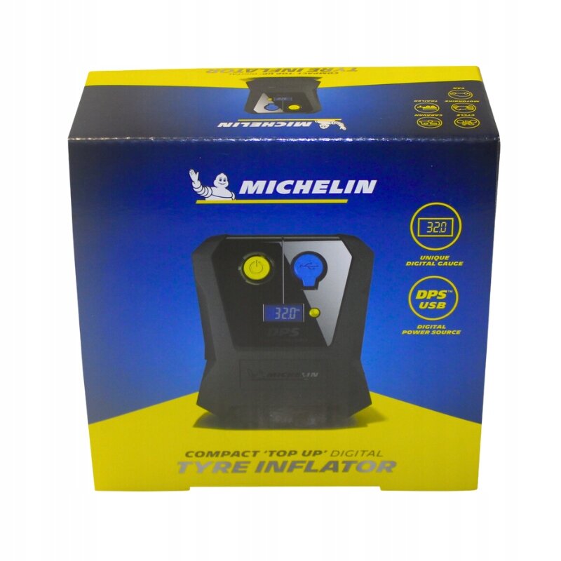 Opakowanie kompresora samochodowego Michelin z widocznym logo producenta i zdjęciem urządzenia. Na opakowaniu znajdują się napisy: \'MICHELIN\', \'320\', \'UNIQUE DIGITAL GAUGE\', \'DPS USB\', \'DIGITAL POWER SOURCE\', \'COMPACT TOP UP DIGITAL TYRE INFLATOR\'.