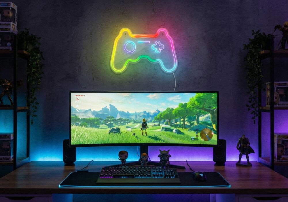 Neon LED FOREVER LIGHT Gamepad FLRNE04 + pilot RTV200004, neon, gamepad, światło, gaming, Tęczowy neonowy kontroler gamingowy (gamepad) na czarnym tle z teksturą cegły.