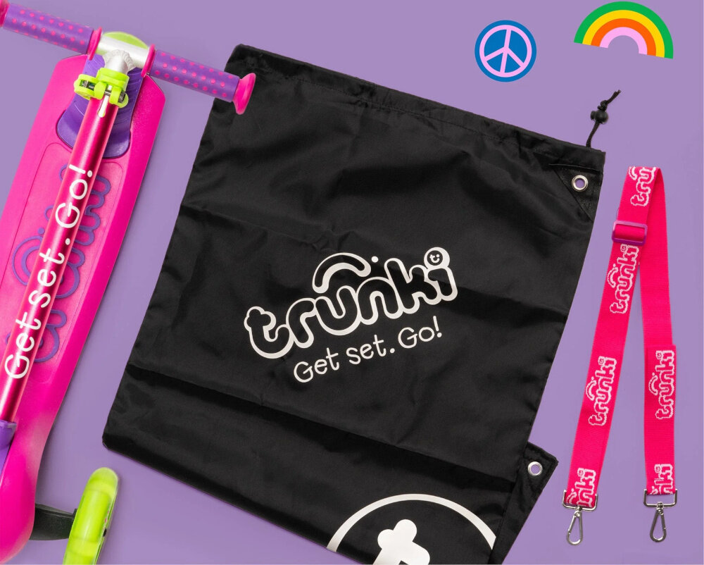 Hulajnoga dla dzieci TRUNKI Mała Różowy fioletowe tło zestaw w zestawie hulajnoga torba pasek dokumentacja