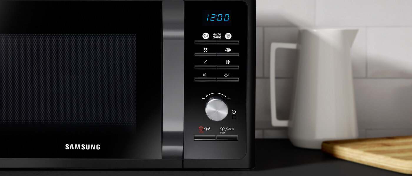 zbliżenie na panel sterowania kuchenki mikrofalowej Samsung MG23F301TAK zbliżenie na panel sterowania kuchenki mikrofalowej Samsung MG23F301TAK