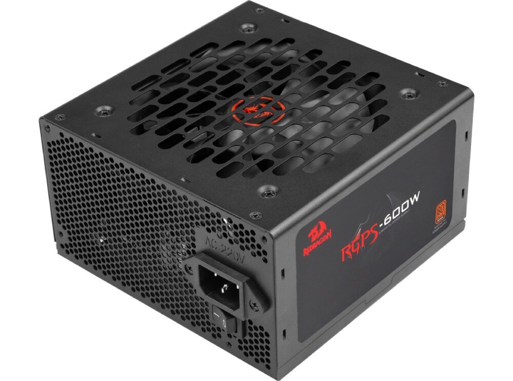 Zasilacz REDRAGON GC-PS024 Zasilacz komputerowy leżący na boku, z widocznym gniazdem zasilania, przyciskiem włączania i dużym otworem wentylacyjnym z góry. Na obudowie znajduje się etykieta z oznaczeniem modelu i mocy 600 W, moc, aktywne PFC