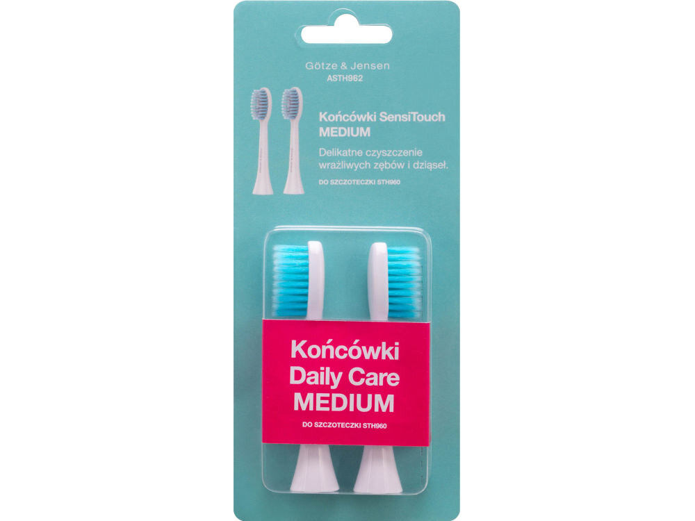 Końcówki GÖTZE & JENSEN ASTH962 SensiTouch MEDIUM Oryginalne opakowanie typu blister zawierające dwie końcówki SensiTouch Medium do szczoteczek sonicznych Götze & Jensen serii STH960. Turkusowa karta produktu zawiera opis Delikatne czyszczenie wrażliwych zębów i dziąseł, a dolna różowa etykieta posiada napis Końcówki Daily Care MEDIUM.