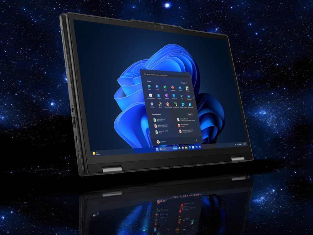 LENOVO ThinkPad X13 przedstawia laptopa uzytkowanego przez osobe w samolocie