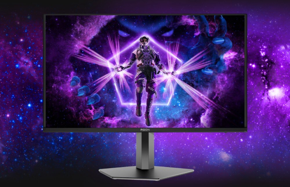Monitor AOC Agon Pro AG326UD Widok frontu monitora na ciemnym tle z wyświetlaną postacią w fioletowej kolorystyce na pełnym ekranie, głośniki, moc, dźwięk, audio