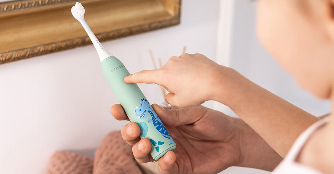 Szczoteczka soniczna SEYSSO Kids Dinosaur Niebieski do dziecięcych potrzeb Technologia soniczna Timer 2-minutowy z sygnałami co 30-sekund Wydajny akumulator czas pracy wodoszczelność IPX7