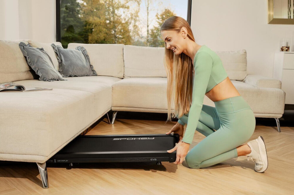 Bieżnia elektryczna SPOKEY Eva 1490W 6km-h wygodne przechowywanie niewielkie wymiary 135 x 52 x 12,5 cm wbudowane kolka transportowe