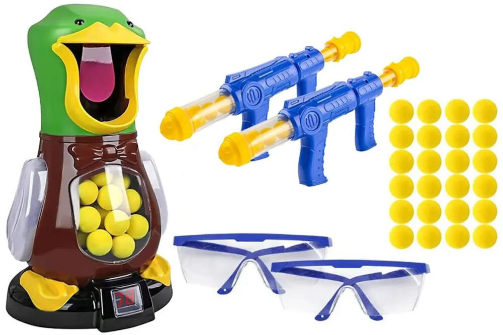 Gra plenerowa EXTRALINK Głodna kaczka Pełny skład zestawu do gry Głodna Kaczka na białym tle: figurka kaczki z licznikiem LCD, dwa niebieskie pistolety powietrzne, dwie pary niebieskich okularów ochronnych oraz zestaw 24 żółtych kulek piankowych.