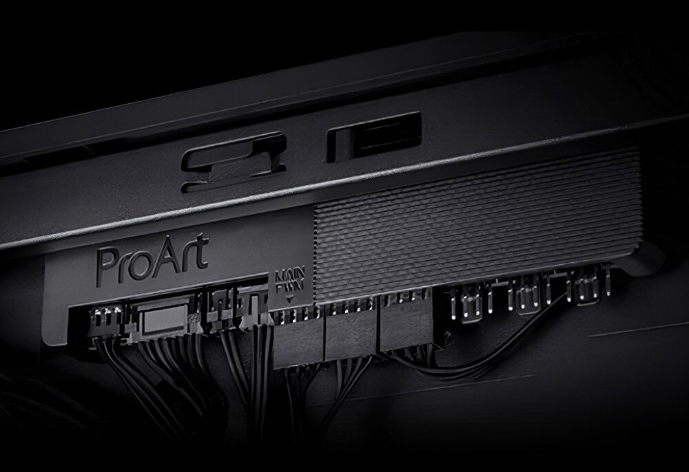 Obudowa ASUS ProArt PA602 Wood Edition Zbliżenie na zintegrowany hub wentylatorów z logo 'ProArt' i podłączonymi przewodami, kontroler wentylatorów, tryby, przełączanie