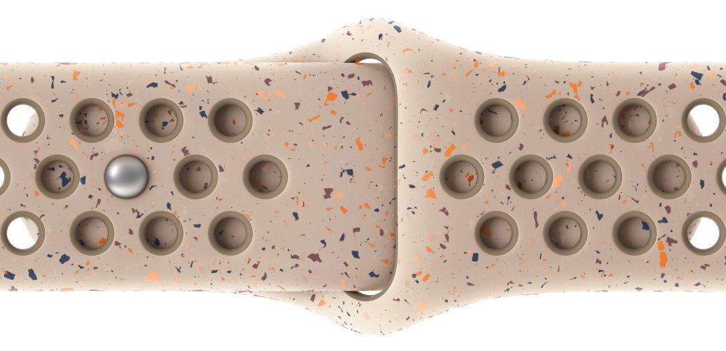 Pasek do Apple Watch Nike wzór z losowo ułożonych kolorowych płatków wykonany z co najmniej 30% fluoroelastomeru z recyklingu