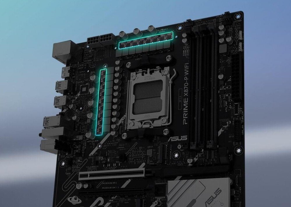 Płyta główna ASUS PRIME X870-P WiFi Zbliżenie na górną część płyty głównej z widocznym gniazdem procesora i podświetlonymi sekcjami zasilania w kolorze turkusowym, procesor, układ zasilania, konstrukcja