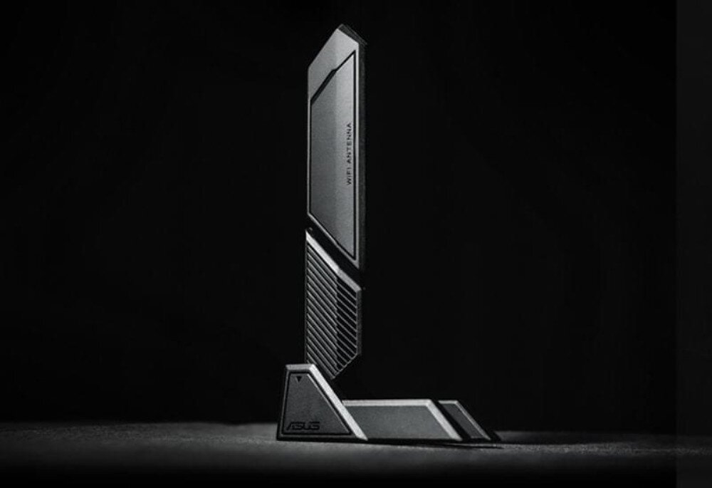 Płyta główna ASUS PRIME X870-P WiFi Ciemne tło z pionowo ustawioną czarną anteną Wi-Fi o geometrycznym kształcie i matowym wykończeniu, łączność Wi-Fi 7, pasmo 6 GHz