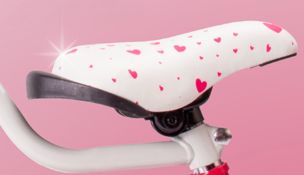 Rower dziecięcy SUN BABY Heart Bike 14 cali dla dziewczynki Malinowy siodełko na różowym tle bezpieczna i satysfakcjonująca aktywność wygodne siodełko możliwość regulacji w zakresie od 50 do 58 cm bezpiecznie komfortowo