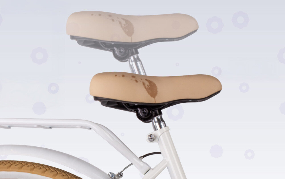 Rower młodzieżowy SUN BABY Flower Bike 24 cale dla dziewczynki Biało-beżowy zbliżenie na siodełko wyszarzona możliwość regulacji zdjęcie na jasnym tle bezpieczna satysfakcjonująca aktywność wygodne siodełko regulacja w zakresie od 71 do 87 cm