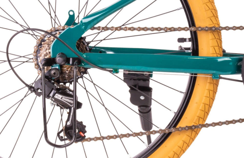 Rower młodzieżowy SUN BABY Verdant 24 cale dla chłopca Zielony zbliżenie na tylną przerzutkę 7 biegów obrotowa manetka Revoshift 7-Speed tylna przerzutka SHIMANO Tourney przerzutki SHIMANO dużą wytrzymałość sprawne działanie zmiana biegów płynna bezproblemowa