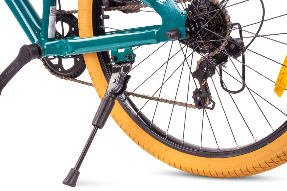 Rower młodzieżowy SUN BABY Verdant 24 cale dla chłopca Zielony zbliżenie na stopkę stopka w centralnym punkcie ciężkości reflektory odblaskowe z przodu z tyłu i na szprychach roweru