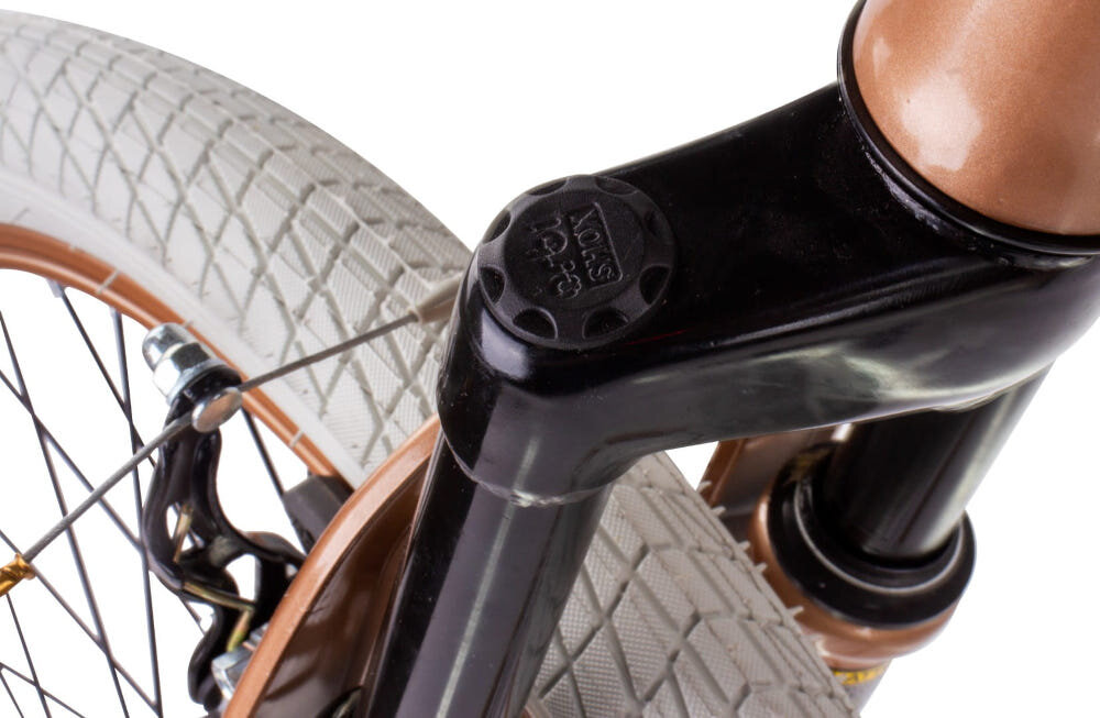 Rower młodzieżowy SUN BABY Verdant 24 cale dla chłopca Cappuccino zbliżenie na amortyzator zdjęcie na białym tle rower typu hardtail przedni amortyzator sprężynowy marki ORBI SHOKS ułatwia najeżdżanie na przeszkody niweluje wstrząsy na kierownicy długość skoku 40 cm