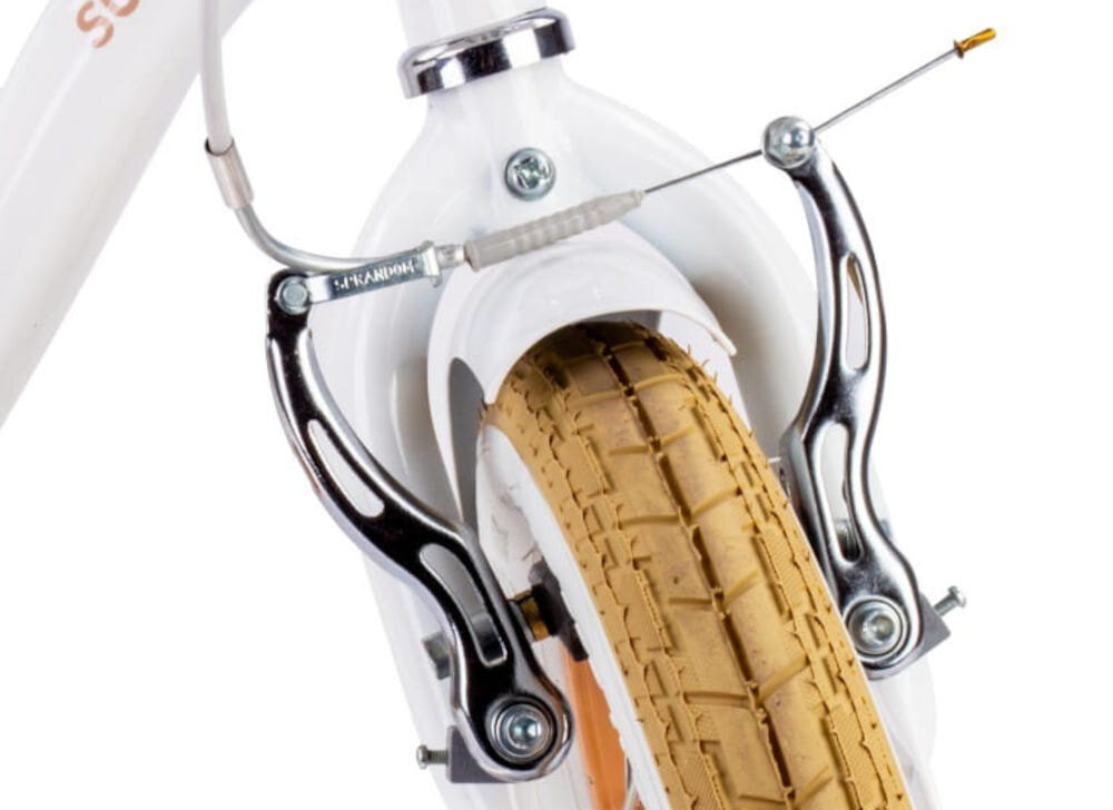 Rower dziecięcy SUN BABY Flower bike 12 cali dla dziewczynki Biało-beżowy zbliżenie na przedni hamulec zdjęcie na białym tle podstawa bezpieczeństwa przedni hamulec V-Brake tylny hamulec nożny Torpedo lekkie duża siła hamowania reflektory odblaskowe na szprychach dobra widoczność na drodze bezpieczeństwo