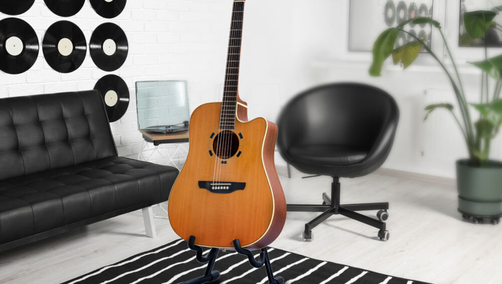 Statyw gitarowy MUSICMATE MM-A50 Moderato
styl i funkcjonalność, elegancki wygląd, prosta konstrukcja, minimalistyczny design, regulowana wysokość statywu w zakresie od 640 do 720 mm,
gitara stojąca na statywie w pokoju