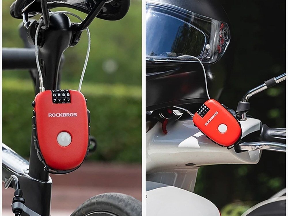 Na obrazie widoczne jest czerwone zapięcie rowerowe z logo ROCKBROS, zamocowane na rowerze i motocyklu. Zapięcie posiada czterocyfrowy zamek szyfrowy ustawiony na 7777.
