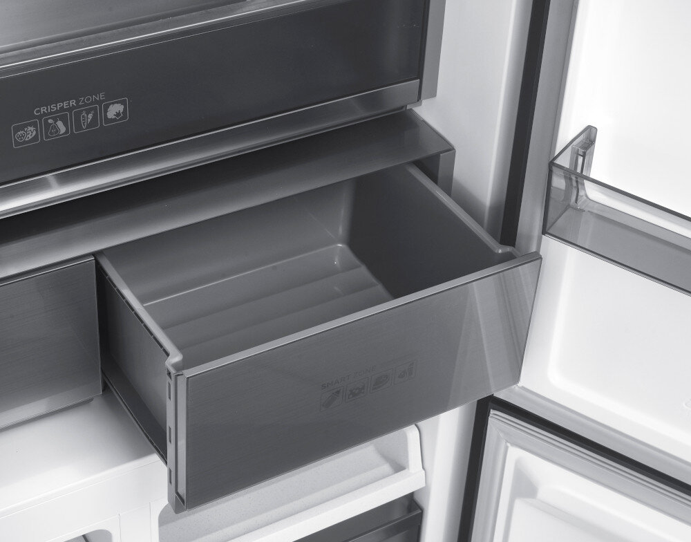 Lodówka BERG CZW190NBG03 Wysuwana szuflada w lodówce, prawdopodobnie przeznaczona do świeżej żywności typu warzywa i owoce (crisper zone) specjalna strefa chłodzenia trzy tryby chłodzenia precyzyjna regulacja temperatura wilgotność świeżość produktów mięso ryby warzywa optymalne warunki smak wartości odżywcze