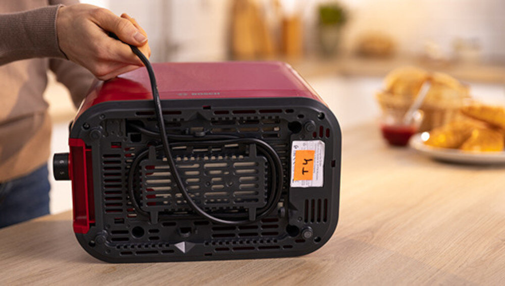 Toster BOSCH TAT3M124 Schowek na przewód przechowywanie regulacja długości dostosowanie komfort użytkowanie