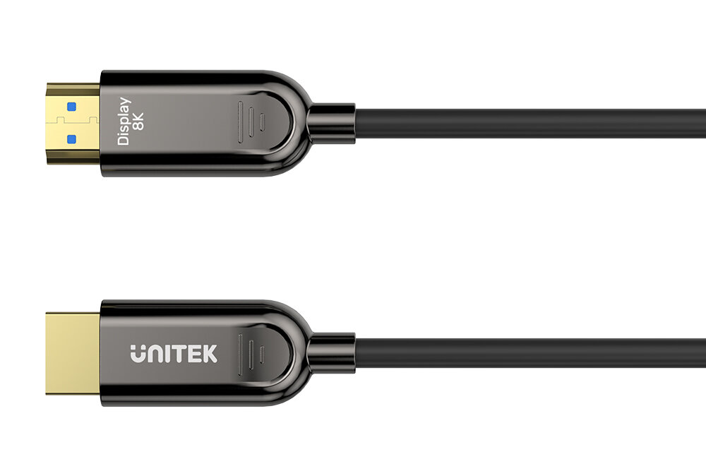 Obraz przedstawia dwa końce kabla HDMI z metalicznymi złączami. Na jednym z nich widoczny jest napis \'Display 8K\', a na drugim \'UNITEK\'.